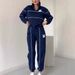 2025 Women's Sweatshirt Letter Heat Transfer Sleeve Long Pants Zipper Casual Sports Two-Piece Set_desvips.com