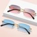 New Outdoor Sports Frameless Oval Cut-edge Glasses, European And American Fashionable Style Ocean Lens Hot Slim Face Sunglasses For Men And Women_desvips.com