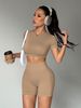 Nude Quick Drying Backless Yoga Suit Set with High Waisted Hip Lifting Sports Fitness Two Piece Running Short Sleeve Fitness Outfit_desvips.com