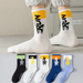 3/5 Pairs Men's All-Season Mid-Calf Athletic Cotton Breathable Basketball Letter Jacquard Color Block Socks EU 38-45 US_desvips.com